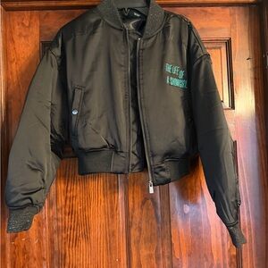 Taylor Swift Black Cropped Bomber Jacket with Teal Script of Life of a Showgirl